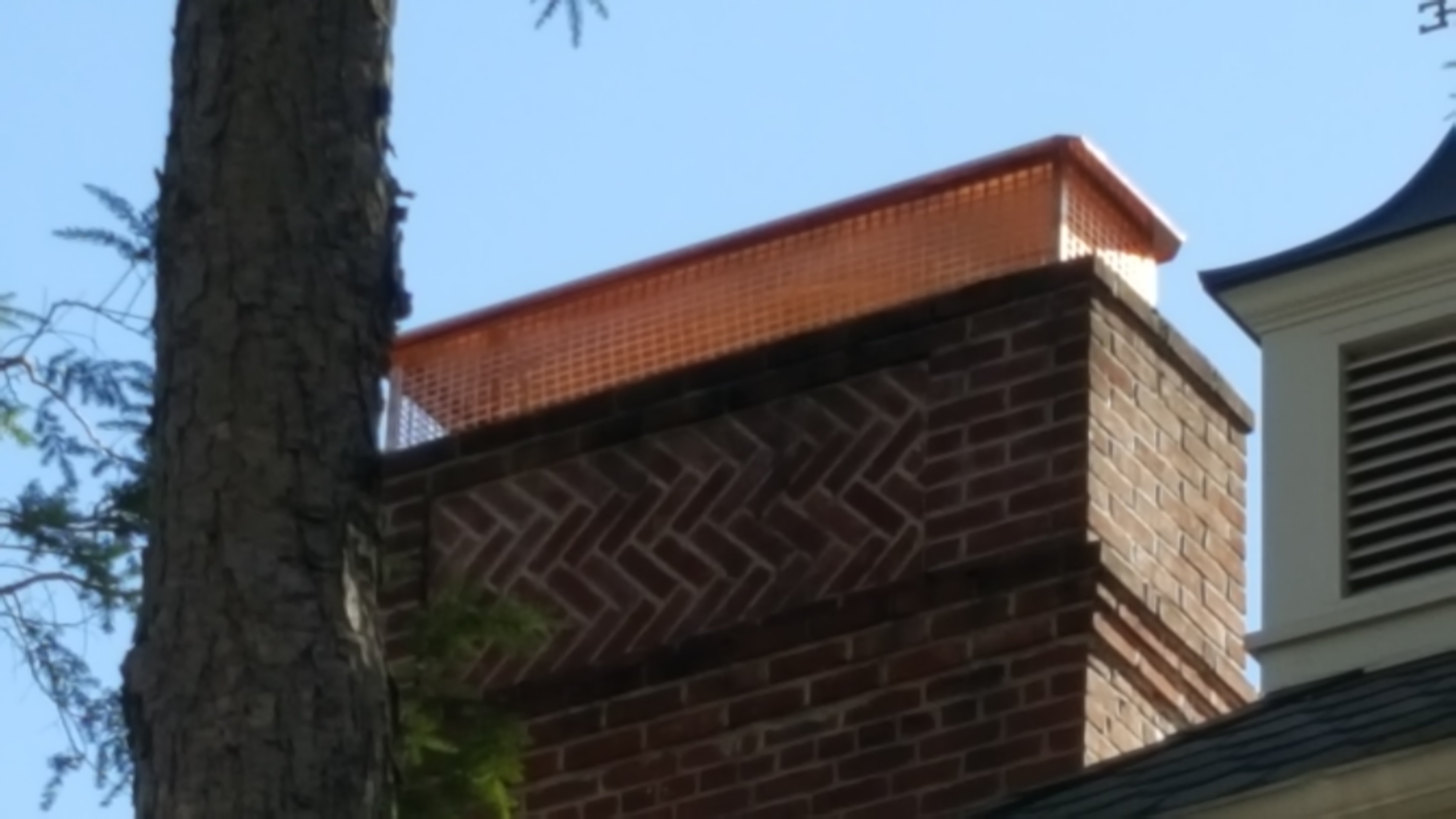 New stainless steel chimney cap installed in West Babylon, NY