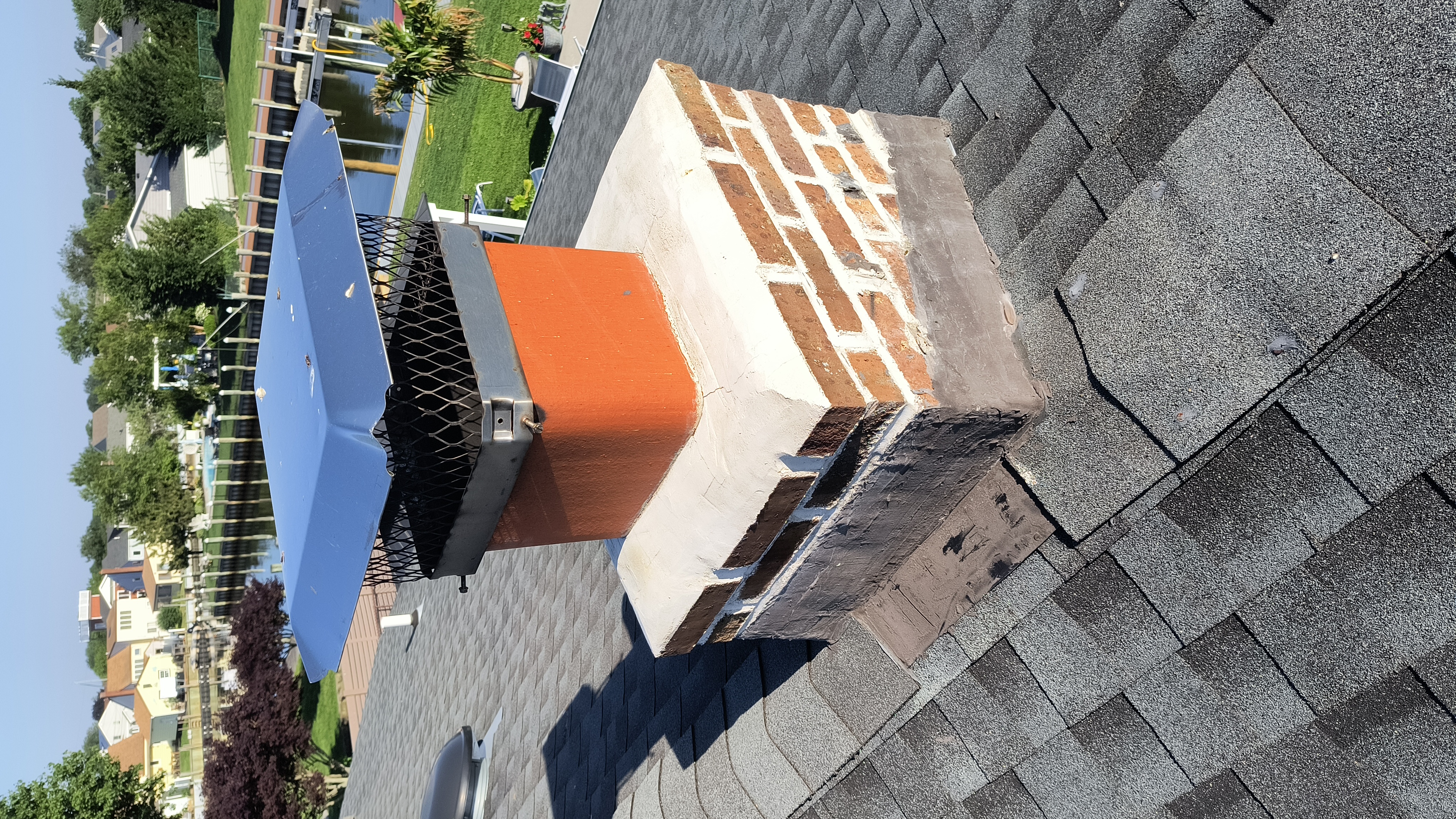 Full chimney masonry rebuild and restoration in West Babylon, NY